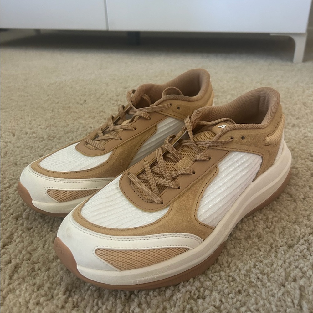 APL women’s tan and cream sneakers